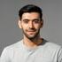 close-up-portrait-of-smiling-handsome-young-caucasian-man-face-looking-at-camera-on-isolated-light-gray-studio-background-photo_cropped